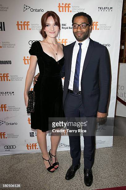 Actor Chiwetel Ejiofor and guest arrive at the 'Half Of A Yellow Sun' Premiere during the 2013 Toronto International Film Festival at the Winter...