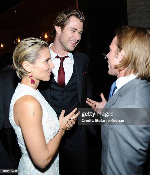 Actress Elsa Pataky, actor Chris Hemsworth and Tom Hunt at the Grey Goose vodka co-hosted party for "Rush" on September 8, 2013 in Toronto, Canada.