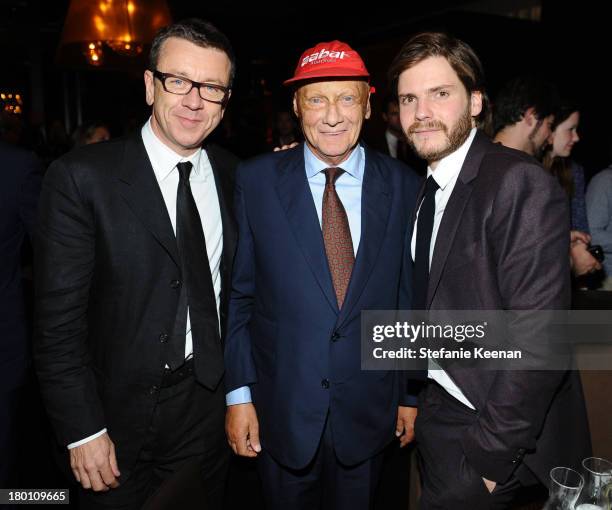 Screenwriter Peter Morgan, former Formula One racing driver Niki Lauda and actor Daniel Brühl at the Grey Goose vodka co-hosted party for "Rush" on...