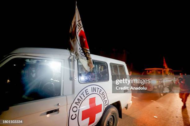 International Red Cross vehicles, carrying Israeli prisoners released from Gaza, are on their way to Rafah crossing under the 4 day deal in Gaza on...