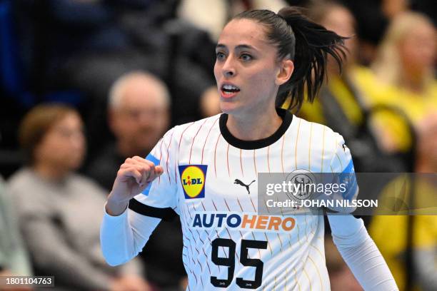 Germany's Johanna Stockschläder celebrates during a women's friendly handball match between Sweden and Germany at the Ystad Arena in Ystad, eastern...