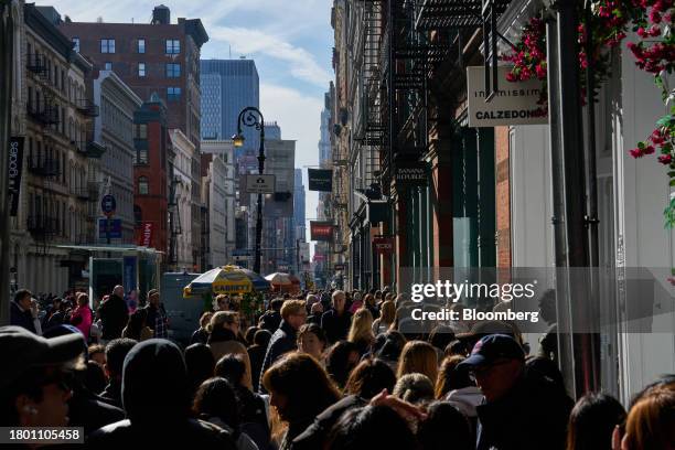 Shoppers on Black Friday in the SoHo neighborhood of New York, US, on Friday, Nov. 24, 2023. An estimated 182 million people are planning to shop...