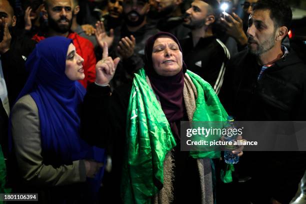 November 2023, Palestinian Territories, Ramallah: Palestinians celebrate as released Palestinian prisoners arrive in Ramallah after being released...