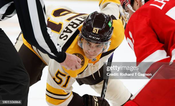Matthew Poitras of the Boston Bruins skates against the Detroit Red Wings during the third period at the TD Garden on November 24, 2023 in Boston,...