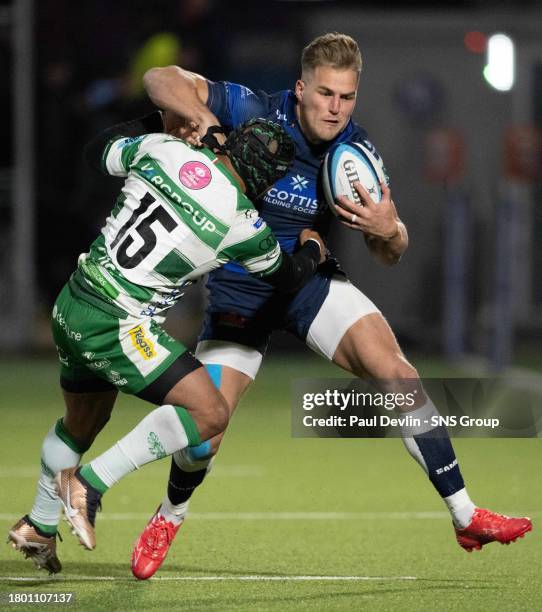 Edinburgh's Duhan van der Merwe and Benetton's Rhyno Smith in action during a BKT United Rugby Championship match between Edinburgh Rugby and...