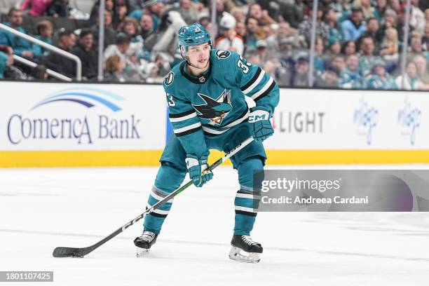 November 24: Calen Addison of the San Jose Sharks skating with the puck during the game against the Montreal Canadiens at SAP Center on November 24,...