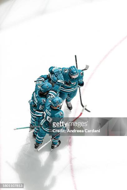 November 24: Mike Hoffman of the San Jose Sharks celebrating a goal with his teammates against the Montreal Canadiens at SAP Center on November 24,...