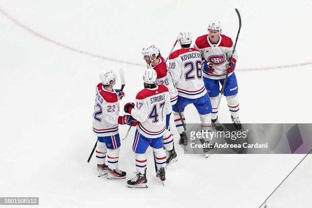 November 24: Johnathan Kovacevic of the Montreal Canadiens celebrating a goal with his teammates against the San Jose Sharks at SAP Center on...