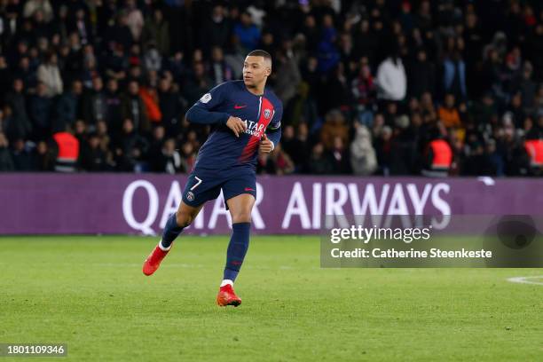 Kylian Mbappe of Paris Saint-Germain looks on during the Ligue 1 Uber Eats match between Paris Saint-Germain and AS Monaco at Parc des Princes on...