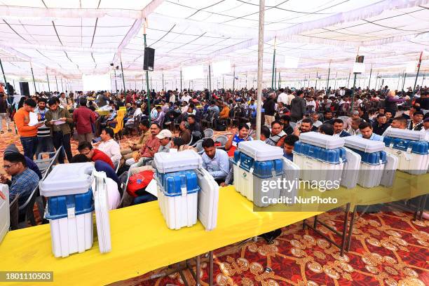 Polling officials are collecting EVMs and other election materials at a distribution center in Jaipur, Rajasthan, India, on November 24 ahead of the...