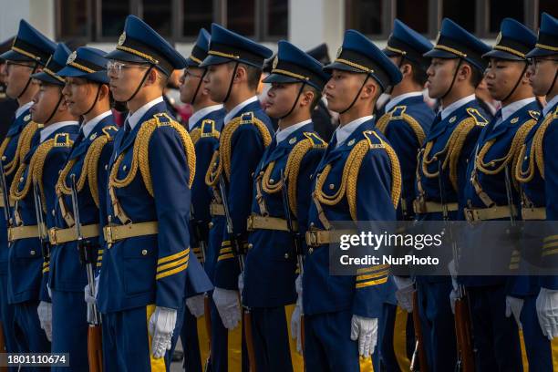 Members of the graduation class of the Hong Kong Correctional Service Department are marching during a passing-out parade at the Hong Kong...