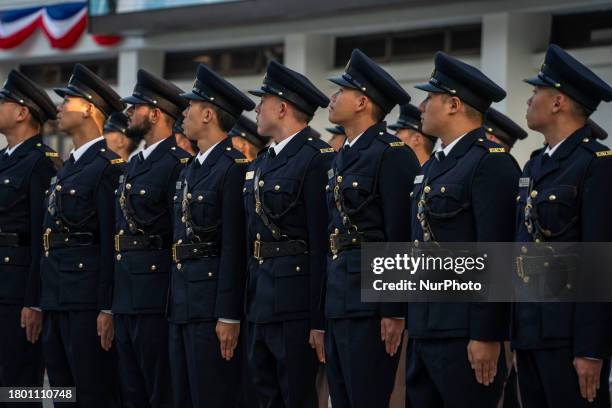 Members of the graduation class are participating in a passing-out parade at the Hong Kong Correctional Services Academy in Hong Kong, China, on...