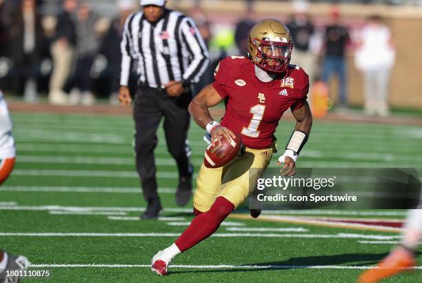 Boston College Eagles quarterback Thomas Castellanos runs with the ball during the college football game between Miami Hurricanes and Boston College...