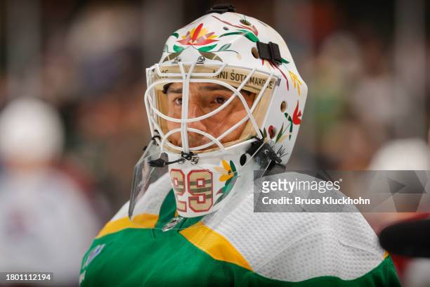 Marc-Andre Fleury of the Minnesota Wild wears a custom Native American Heritage night mask in warmups prior to the game against the Colorado...