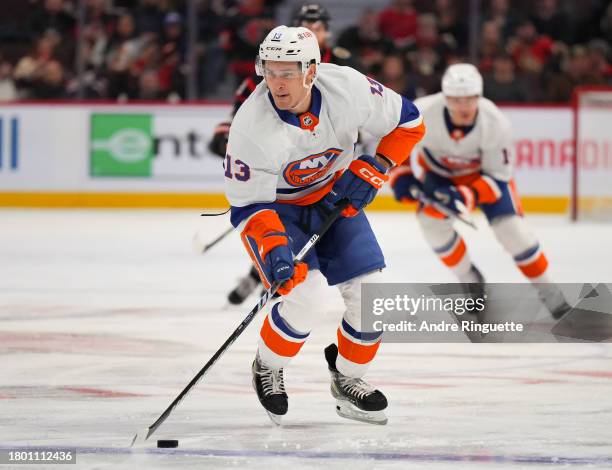 Mathew Barzal of the New York Islanders controls the puck against the Ottawa Senators during the second period at Canadian Tire Centre on November...