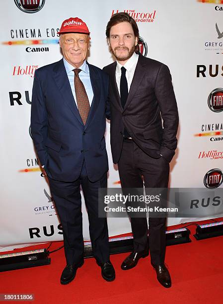 Former Formula One racing driver Niki Lauda and actor Daniel Brühl at the Grey Goose vodka co-hosted party for "Rush" on September 8, 2013 in...