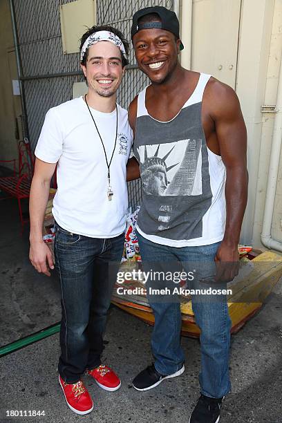 Actors Ben Feldman and Edwin Hodge attend Crab Cake 2013 at The Pikey on September 8, 2013 in Los Angeles, California.