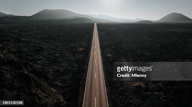 endless highway volcanic landscape lanzarote timanfaya national park - timanfaya national park stock pictures, royalty-free photos & images