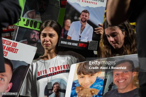 Families of hostages react during a rally to demand that Israeli Prime Minister Benjamin Netanyahu secures the release of Israeli hostages following...