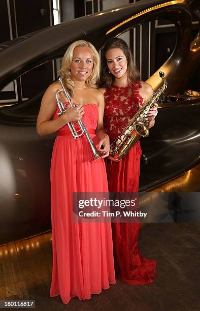 Tine Thing Helseth and Amy Dickson attend a photocall to launch the 2013 Classic Brit Awards at Home House on September 9, 2013 in London, England....