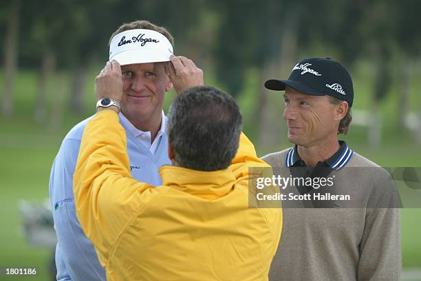 Colin Montgomerie and Bernhard Langer share a laugh during the taping of a Ben Hogan television spot during practice for the Nissan Open on February...