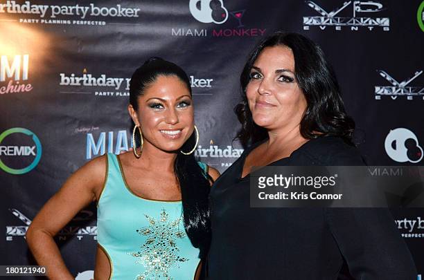 Marissa and Jennifer Graziano pose for photos during the "Miaimi Monkey" New Screening at 49 Grove on September 8, 2013 in New York City.