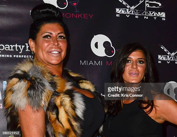 Angela "Big Ang" Raiola and Raquel poses for photos during the "Miaimi Monkey" New Screening at 49 Grove on September 8, 2013 in New York City.