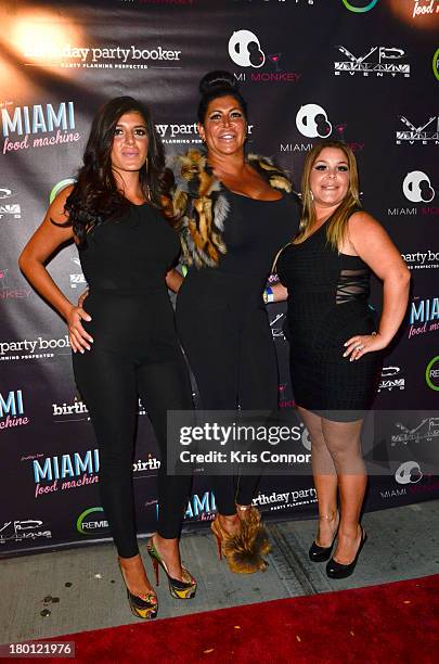 Angela "Big Ang" Raiola, Raquel and Roxanne pose for photos during the "Miaimi Monkey" New Screening at 49 Grove on September 8, 2013 in New York...