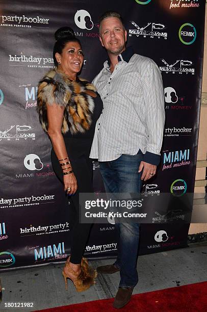 Angela "Big Ang" Raiola and Neil Murphy pose for photos during the "Miaimi Monkey" New Screening at 49 Grove on September 8, 2013 in New York City.