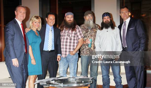 Steve Doocy, Gretchen Carlson, Brian Kilmeade, John Lynch and The cast of "Duck Dynasty" Si Robertson, Jep Robertson and Willie Robertson visit "Fox...