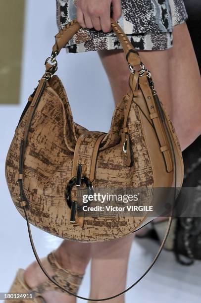 Model walks the runway at the Diane Von Furstenberg Ready to Wear fashion show during Mercedes-Benz Fashion Week Spring Summer 2014 at The Theatre at...