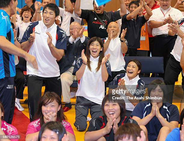 London Olympics gold medalists for wrestling, Tatsuhiro Yonemitsu, Saori Yoshida, Kaori Icho celebrate as wrestling voted back onto the Olympics...