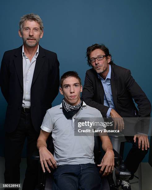 Actor Jacques Gamblin, actor Fabien Heraud and director Nils Tavernier of 'The Finishers' pose at the Guess Portrait Studio during 2013 Toronto...