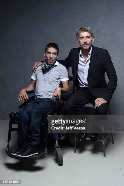 Actors Fabien Heraud and Jacques Gamblin of 'The Finishers' pose at the Guess Portrait Studio during 2013 Toronto International Film Festival on...