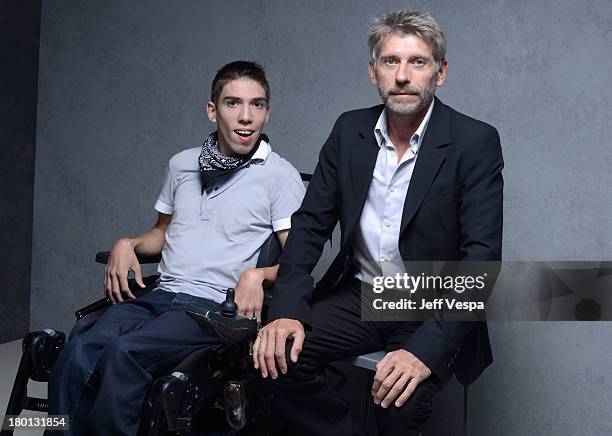 Actors Fabien Heraud and Jacques Gamblin of 'The Finishers' pose at the Guess Portrait Studio during 2013 Toronto International Film Festival on...