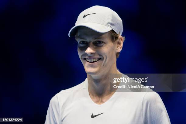 Jannik Sinner of Italy smiles during the final singles match against Novak Djokovic of Serbia during day eight of the Nitto ATP Finals. Novak...