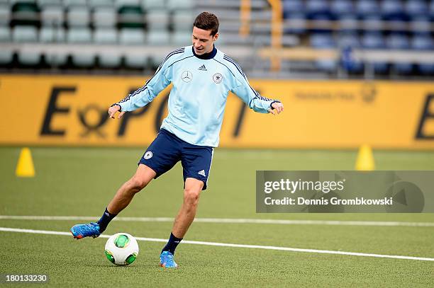 Julian Draxler of Germany looks on during a training session ahead of the FIFA 2014 World Cup Qualifier match between Faroe Islands and Germany on...