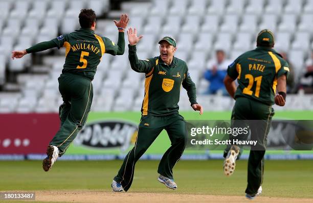 Steven Mullaney of Nottinghamsire celebrates with David Hussey after taking the wicket of Somerset's Peter Trego during the Yorkshire Bank 40 Semi...