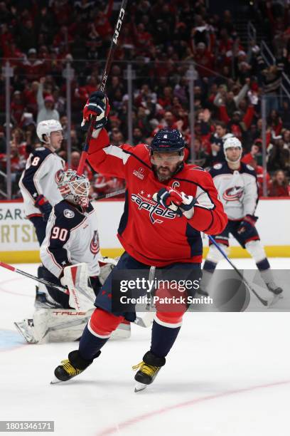 Alex Ovechkin of the Washington Capitals celebrates after scoring a goal against the Columbus Blue Jackets during the second period at Capital One...