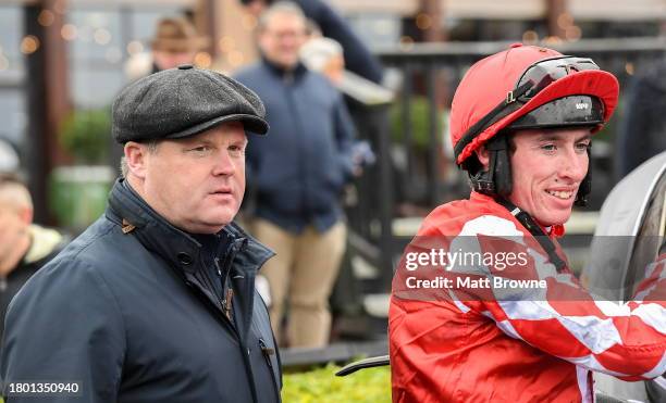 Kildare , Ireland - 25 November 2023; Trainer Gordon Elliott with jockey Jack Kennedy after winning the John Lynch Carpets 3 Year Old Maiden Hurdle...