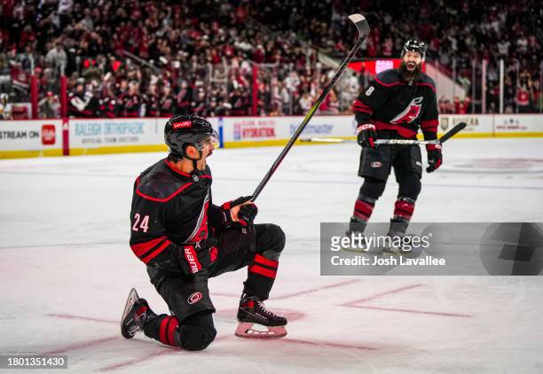 Seth Jarvis of the Carolina Hurricanes celebrates after a goal during the third period against the Pittsburgh Penguins at PNC Arena on November 18,...