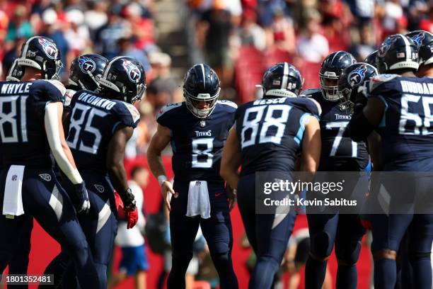 Will Levis of the Tennessee Titans and the offense huddles during an NFL football game against the Tampa Bay Buccaneers at Raymond James Stadium on...