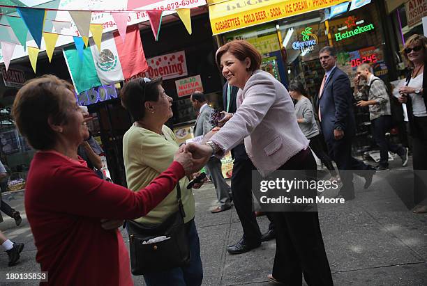 New York City Democratic mayoral candidate Christine Quinn asks for support while campaigning on the streets on September 9, 2013 in the Queens...