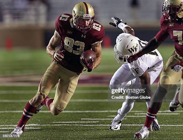 Boston College Eagles wide receiver Alex Amidon heads for the end zone drawing first blood on a first quarter touchdown off a Wake Forest Demon...