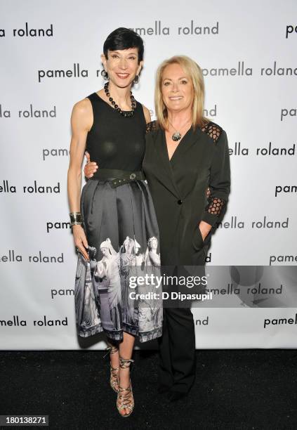 Amy Fine Collins and Pamella Roland pose backstage at the pamella roland Spring 2014 fashion show during Mercedes-Benz Fashion Week on September 9,...