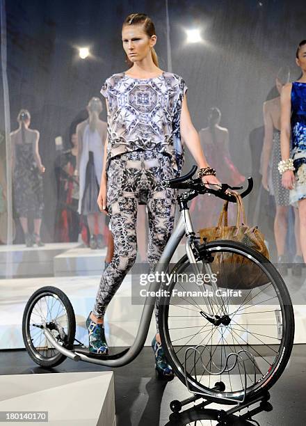 Model poses on the runway at the Czar By Cesar Galindo presentation during Mercedes-Benz Fashion Week Spring 2014 at The Box at Lincoln Center on...