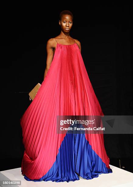 Model poses on the runway at the Czar By Cesar Galindo presentation during Mercedes-Benz Fashion Week Spring 2014 at The Box at Lincoln Center on...