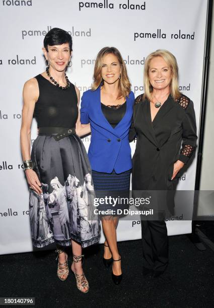 Amy Fine Collins; Natalie Morales-Rhodes and Pamella Roland pose backstage at the pamella roland Spring 2014 fashion show during Mercedes-Benz...