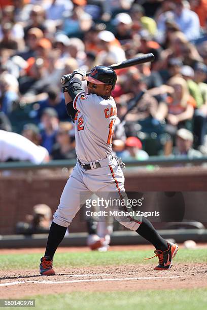 Alexi Casilla of the Baltimore Orioles bats during the game against the San Francisco Giants at AT&T Park on August 11, 2013 in San Francisco,...