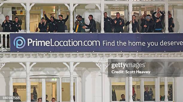 The Nottinghamshire team celebrate on the balcony as they hit the winning runs during the Yorkshire Bank 40 Semi Final match between Nottinghamshire...